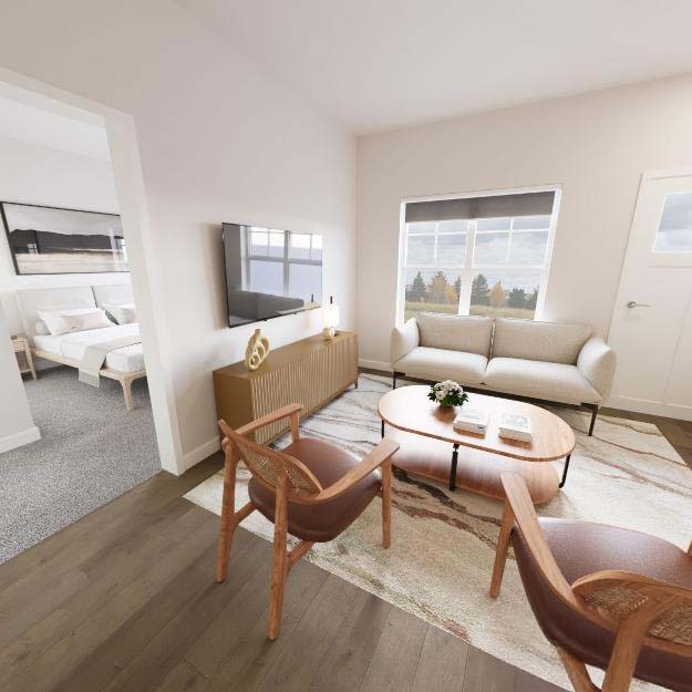 Spacious Solhaven two-bedroom apartment with seating area and kitchen.