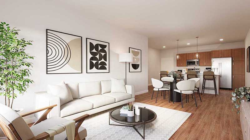 Living area with soft seating, TV, and bright front door sidelights.