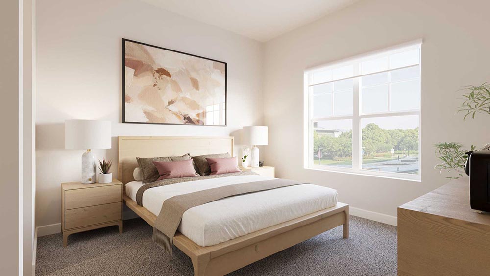 Primary bedroom with large window, neutral bedding, and modern artwork.